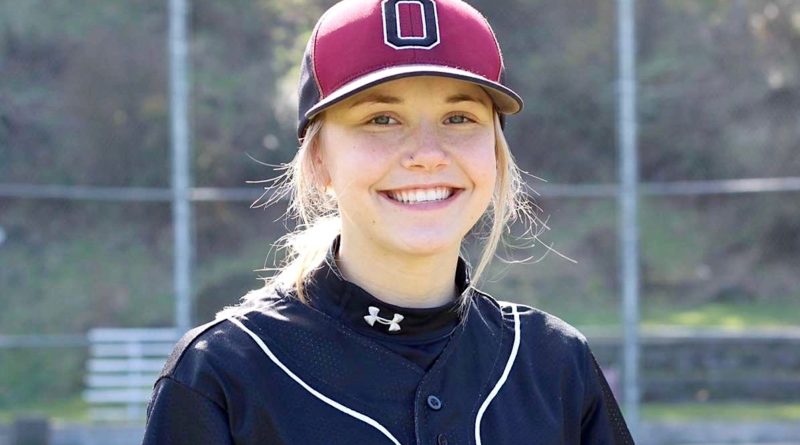K.J. Hopfer, Ocosta softball player is playing baseball. She is signed at San Diego.